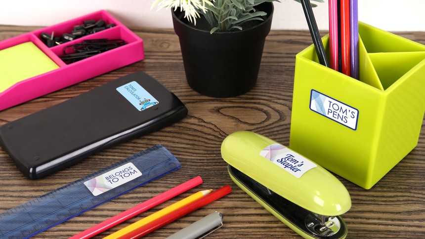 Avery Heavy Duty Labels on desk with stationery