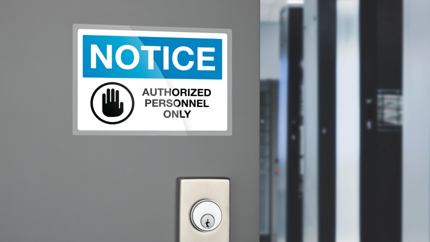 Self Laminating Labels on a door to a room that reads Notice Authorise Personnel