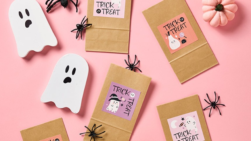 Halloween square stickers in pink background with spiders and pumpkin and ghost props