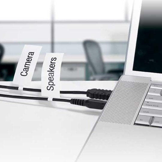 Cable Marker Labels attached to Laptop on Computer in the Office