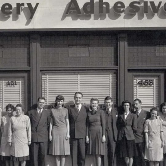 Square trimmed picture of Stan Avery and staff infront of the Avery's office