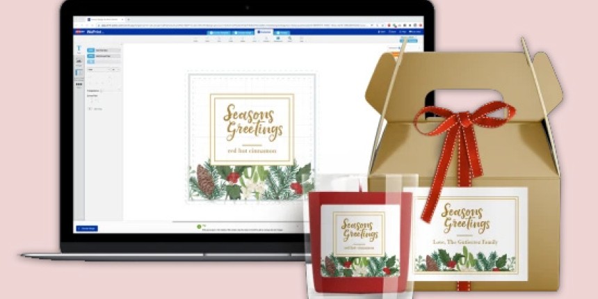 Seasons Greetings Christmas Design Templates on the computer and printed labels on gift box and candles.