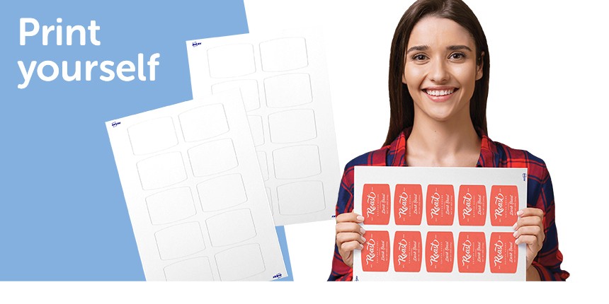 Print Yourself Barrel Labels - Woman holding a sheet of barrel shaped labels