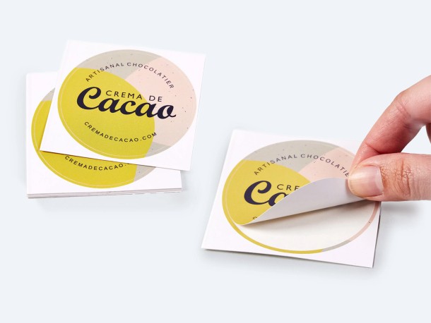 Round Sticker being peeled off backing sheet