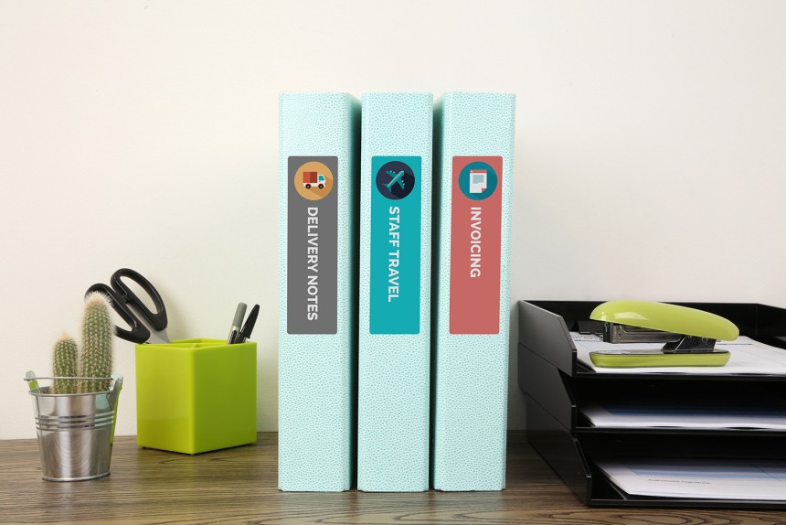 Avery Lever Arch File Spine Labels on folder on desk