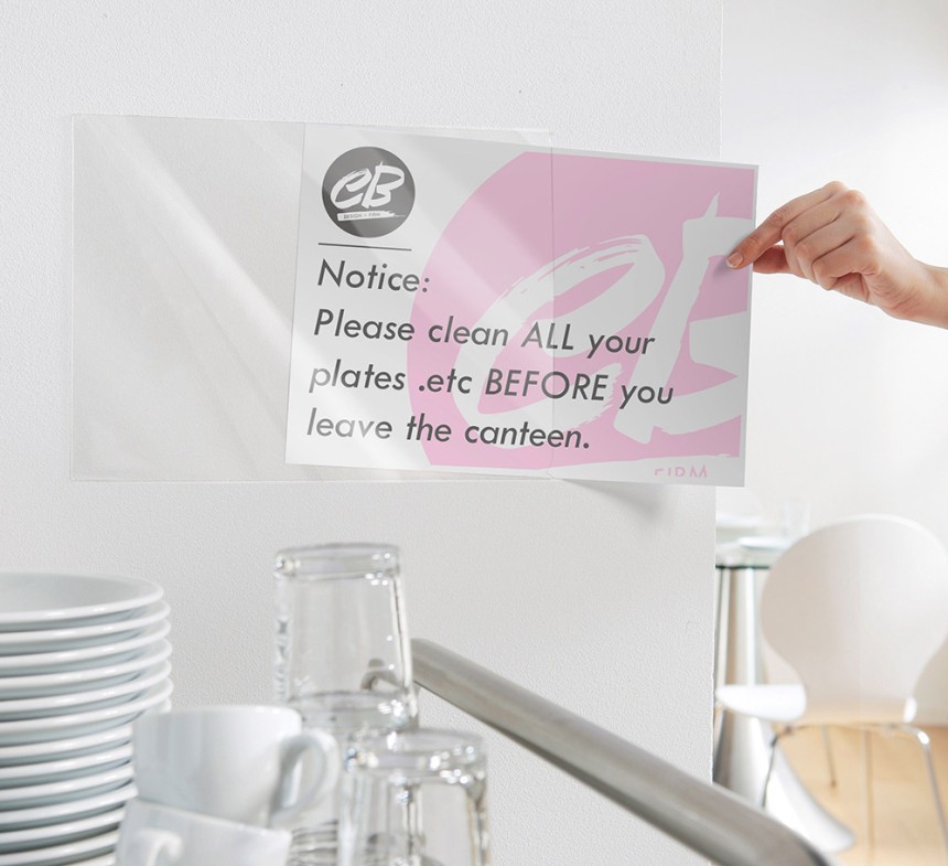 Adhesive sign pocket on wall 