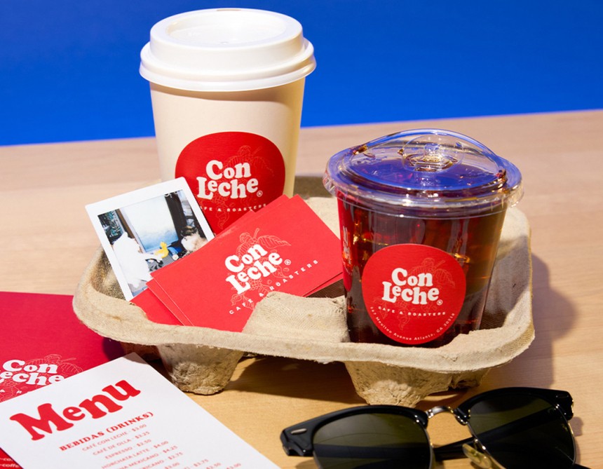 image of coffee cups in a cardboard holder, the coffee cups have labels on them