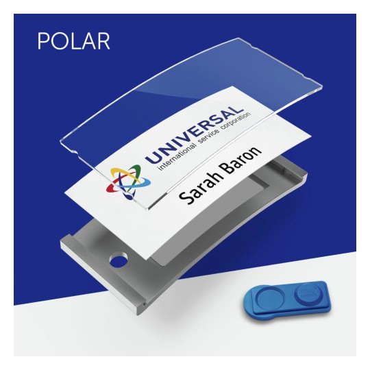 The image shows a name badge setup featuring a clear plastic cover, a white card with the name 'Sarah Baron' and the logo of 'Universal International Service Corporation', along with a blue magnetic fastener, all against a blue background.