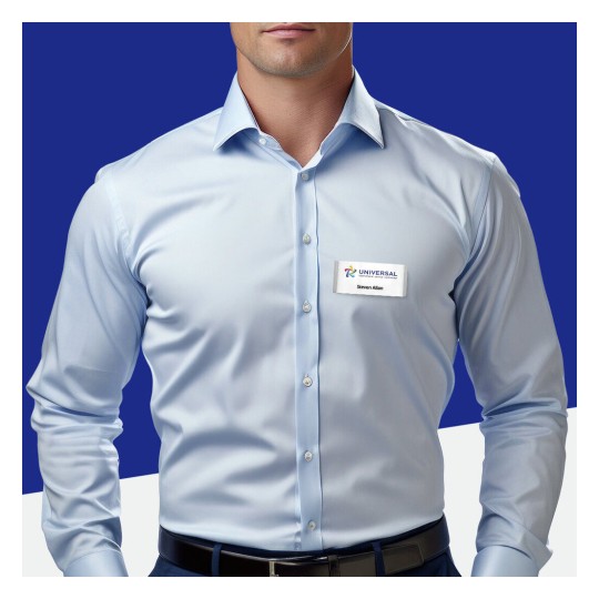 The image features a man wearing a light blue dress shirt with a name badge. The background is a solid blue, and the individual appears to be in a professional setting.