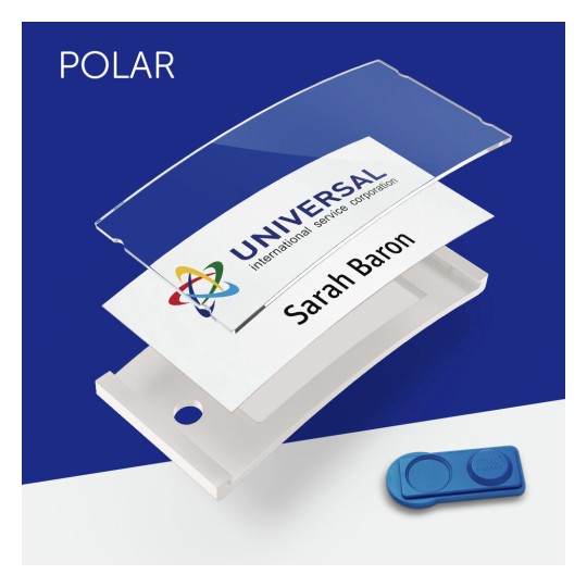 The image shows a name tag system with a clear plastic cover, a name card that reads 'Sarah Baron', and a white base with a blue accent piece. The background is blue with 'POLAR' at the top.