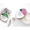 A bottle of "Bellezza Parfum" and a jar of "Bellezza Creme" are shown on a white surface. The bottle has a label with a close-up of dew-covered leaves. The jar's lid has a label with a close-up of a pink, dew-covered flower. A small white plastic spatula is placed between the two products.
