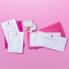 Printed A6 and DL card on bright pink background. It is an invitation for a beauty salon launch