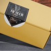 WePrint Arched label applied as a seal label on brown box edge.