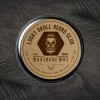 Label applied to a metal tin. The label is kraft brown and has the branding "Lucky Skull Beard Club"