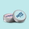 2 lipbalm tins with labels on top. Round Labels and Stickers
