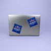 Weprint printed stickers squares on laptop