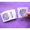 Clear Stickers on a stack on a purple background