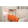 Chemical taken out of freezer with tough labels on hazardous chemicals in freezing temperatures