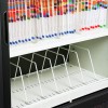 The image shows a filing cabinet with colorful folders on the top shelf and empty dividers on the bottom shelf, used for organizing documents.