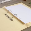 The image shows a yellow folder with a sheet of white paper inside, secured by a binder mechanism. A keyboard is visible in the background.