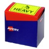 The image shows a colorful box with a red top and blue sides labeled as 'HEAVY' with a caution symbol. The box is from the brand Avery.