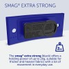 The image features a blue magnetic fastener labeled 'SMAG® EXTRA STRONG,' highlighting its holding power of up to 2kg. It is suitable for thicker fabrics and includes several language warnings about its use around pacemakers.