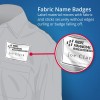 This image is an infographic of how Avery Fabric Name Badge Labels work. There is text on the right that reads - "Fabric Name Badges - Label material moves with fabric and sticks securely without edges curling or badge falling off " The image features a grey coloured shirt with a fabric name badge on it. On the right of this, there is a zoomed in image of how the Fabric Name Badge label works with a red circle and line bordering this.